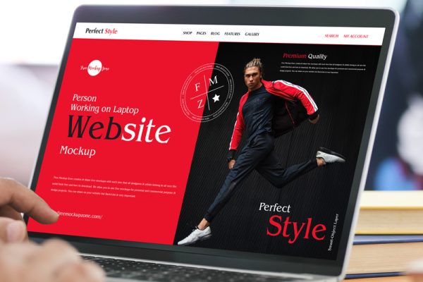 Free-Person-Working-on-Laptop-Website-Mockup-600